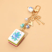 Load image into Gallery viewer, Mahjong Tile Drop Bow Pearl Heart Charm Embellished Keychain Bag Charm
